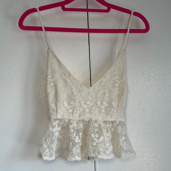Criss cross backless ruffle hem halter top - Picture 1 of 4